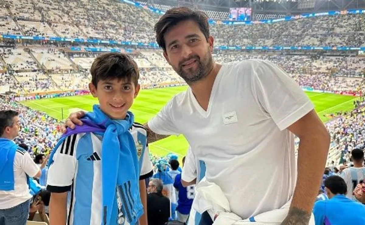 Piscu junto a su hijo en la última Copa del Mundo.