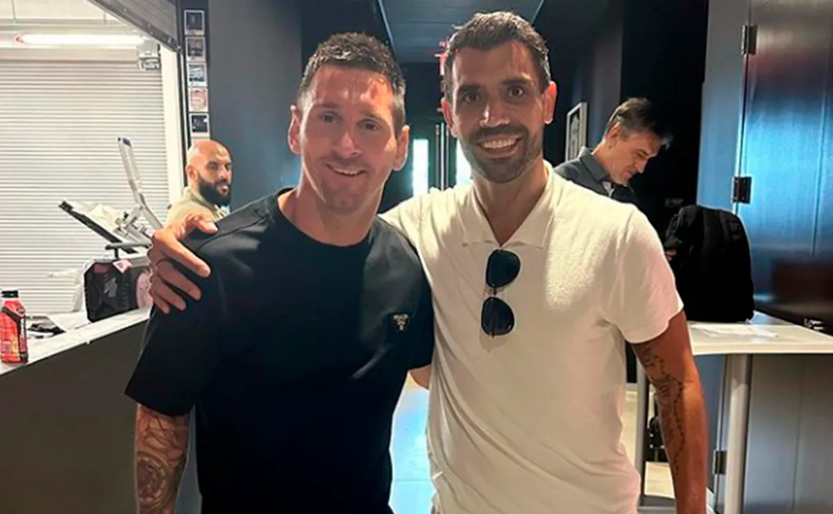 Augusto con Messi.