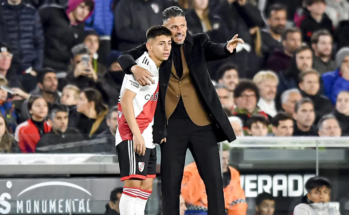 Demichelis junto a Claudio Echeverri.