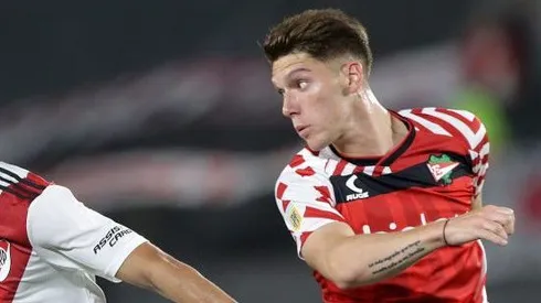 Rollheiser jugando ante River por el torneo local.