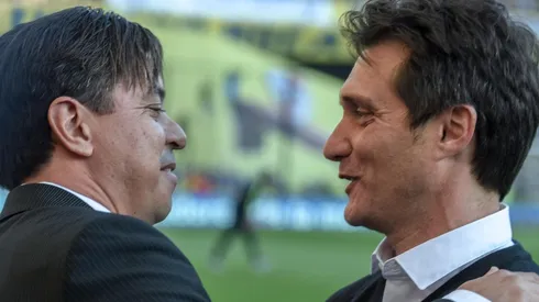 Marcelo Gallardo con Guillermo Barros Schelotto, uno de los DT que pasaron por Boca durante el ciclo del Muñeco.