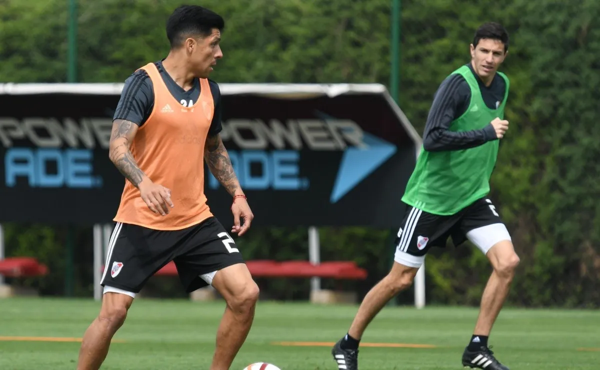 Enzo Pérez e Ignacio Fernández durante un entrenamiento en el River Camp.
