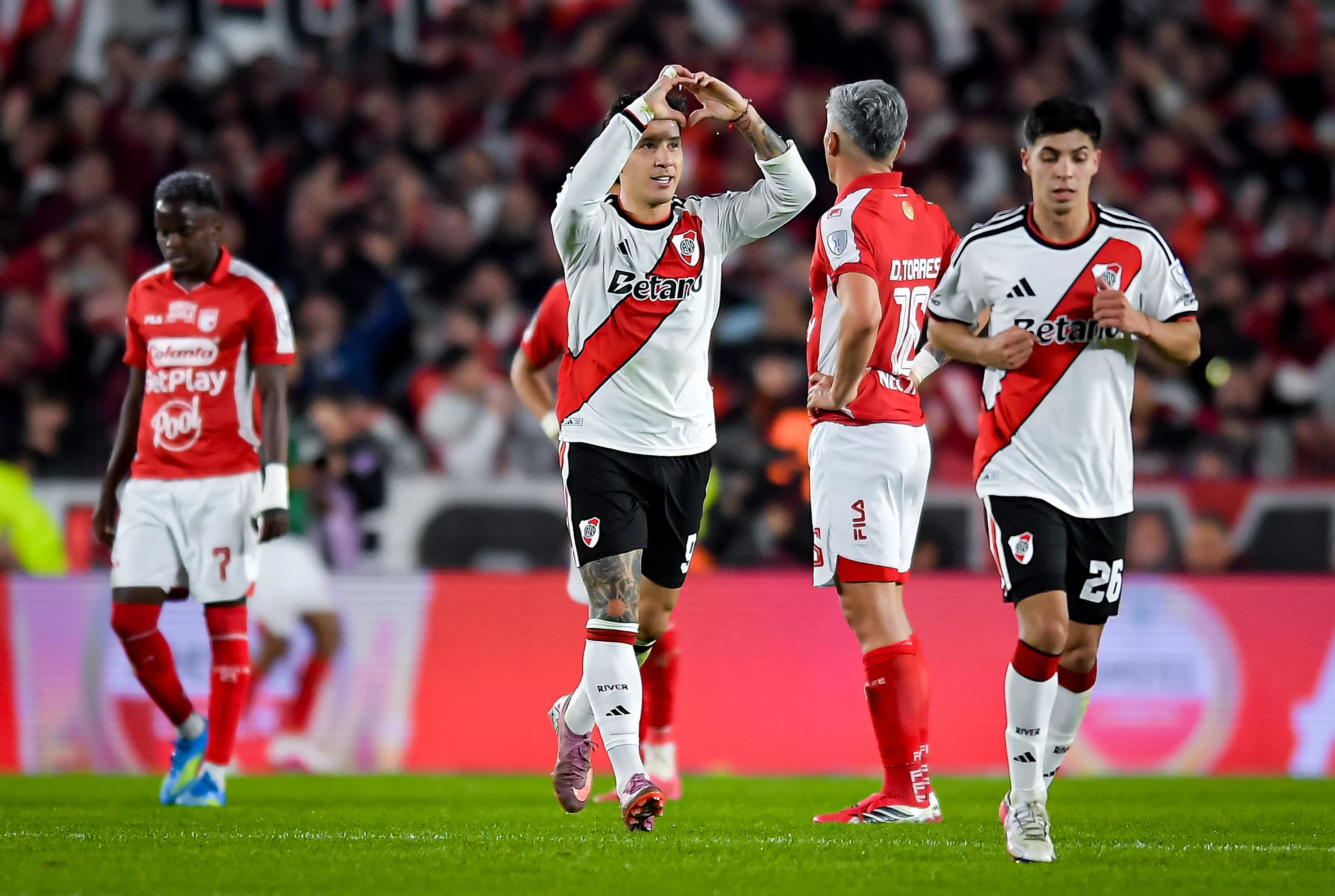 Driussi festeja el 1-0 de River sobre Santa Fe. (Getty Images)